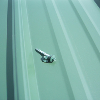 Stainless steel capped painted roofing